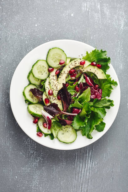 istock Lettuce salad with cucumber, avocado. 1221836170