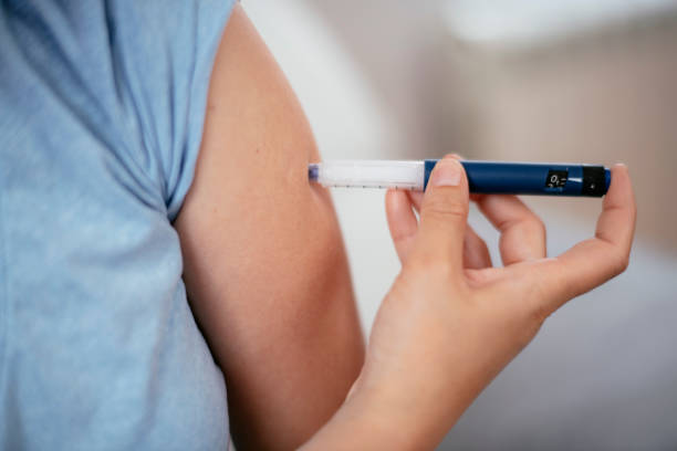 istock Injection with insulin pen stock photo 1221837081