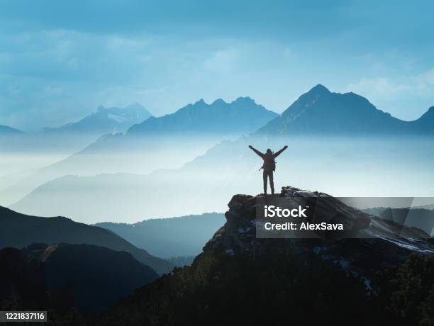 Positive Man Celebrating Success Stock Photo - Download Image Now - Mountain, Mountain Peak, On Top Of