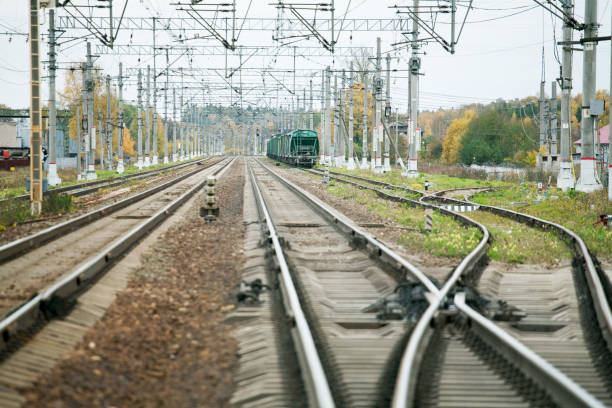istock freight train at the station with rails and arrows 1221837329