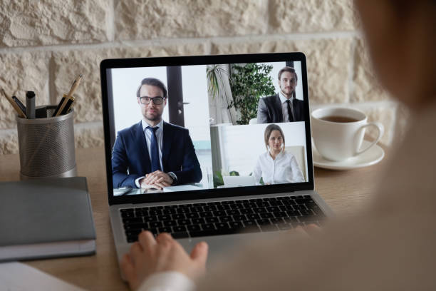 istock Businesspeople have webcam conference using laptop gadget 1221837402