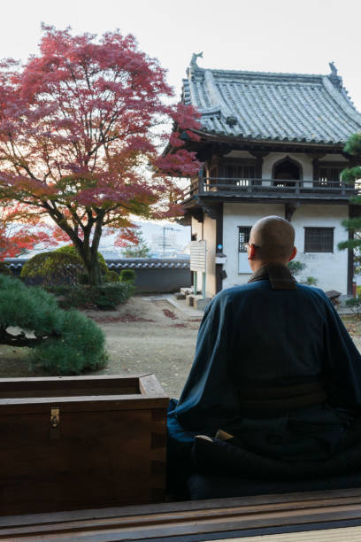istock Buddhist monks performing zen at autumn temple 1221839132