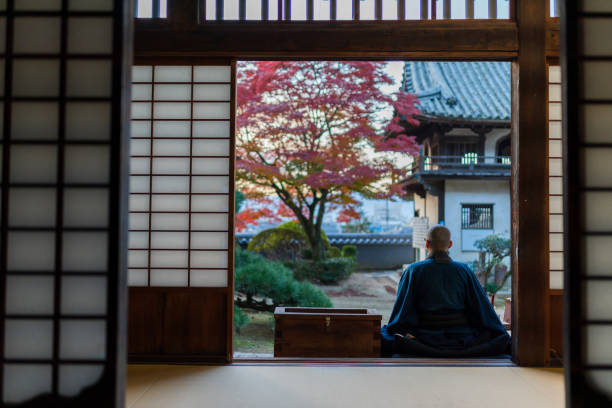 istock Buddhist monks performing zen at autumn temple 1221839138