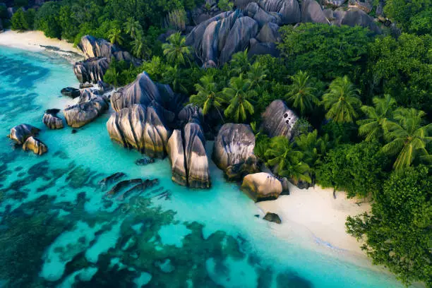 Beautiful beach with white sand on a tropical island in the Seychelles - The famous beach of Anse d'Argent in La Digue