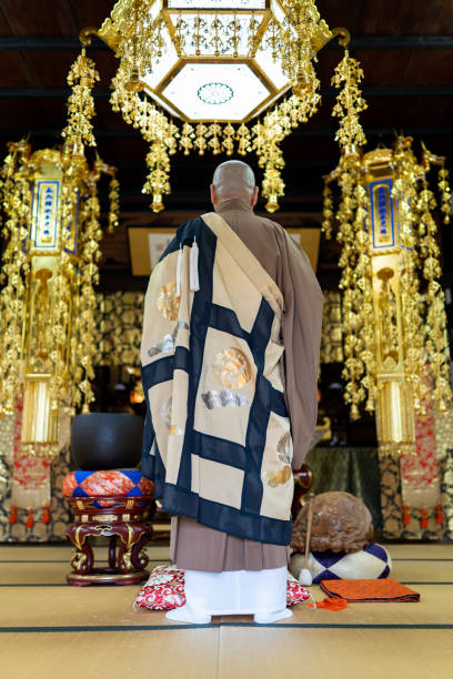 istock Monk praying at the temple 1221841161