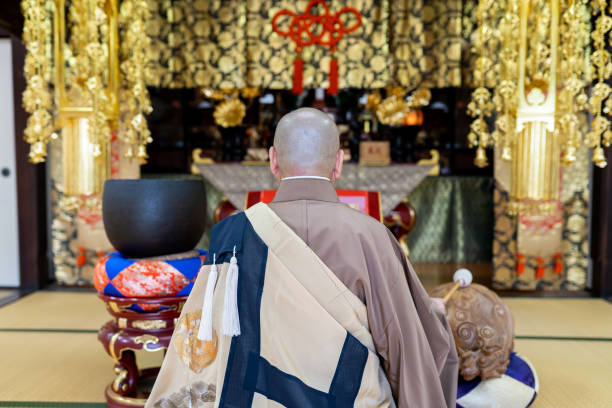 istock Monk praying at the temple 1221841164