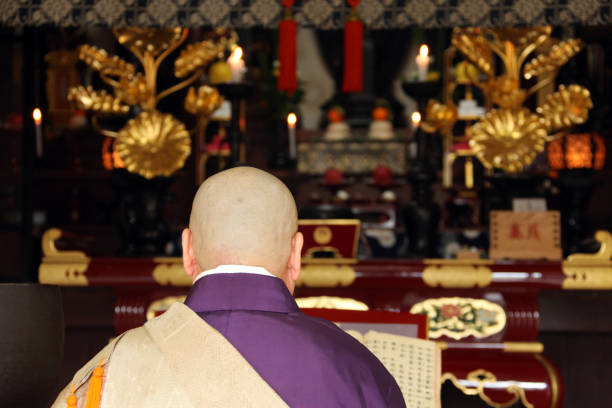 istock Monk praying at the temple 1221841307