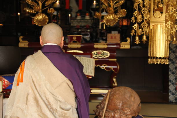 istock Monk praying at the temple 1221841361
