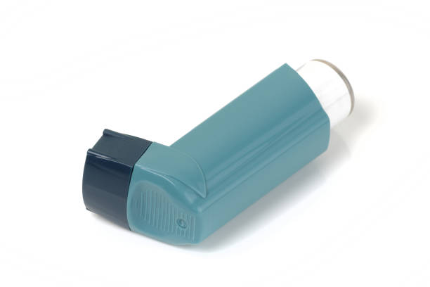 istock Checkmark shaped Inhaler for asthma isolated on white 1221843577