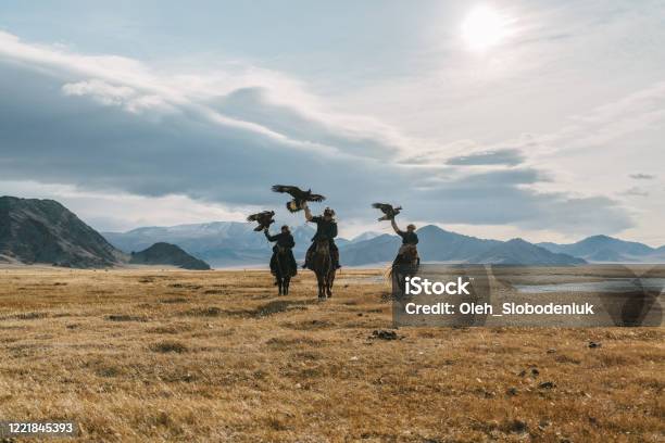 Portrait Of Group Of Eagle Hunters Near The River In Mongolia Stock Photo - Download Image Now