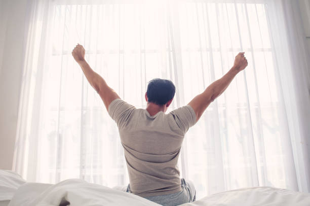istock Man waking up in the morning 1221846655