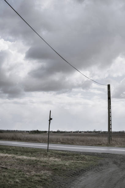 istock empty old road with vintage power line poles 1221849314