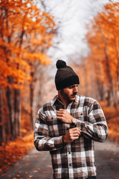 istock man alone in a autmnal road 1221849543