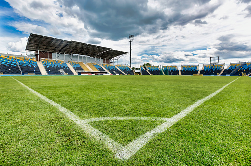 Low angle view of football soccer pitch and stadium