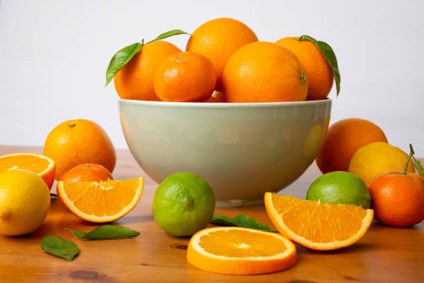 istock Grey ceramic bowl with fresh citrus fruits 1221855027