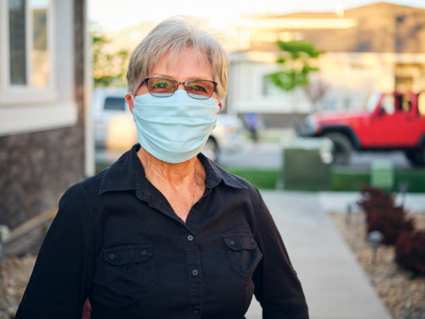 istock Senior Woman Wearing Mask 1221856835