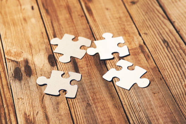 istock Group of white paper jigsaw puzzles 1221862222
