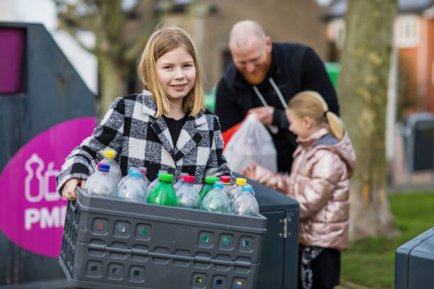 istock Family recycling plastic bottles 1221864092
