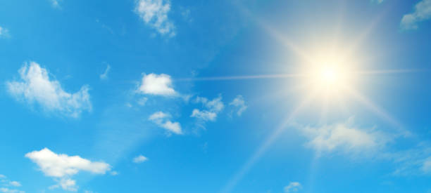 istock Couds in the blue sky. Bright midday sun illuminates the space. 1221864424