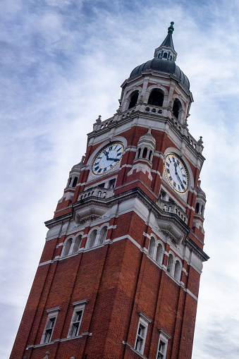 Part of the famous clock tower on Croydon Town Hall. Croydon is a large suburb of London and historically within the county of Surrey. The clock tower was built in the late 19th century.