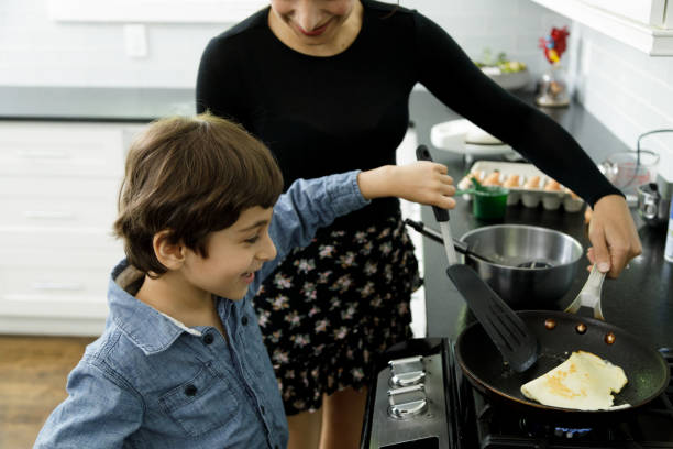 istock Little Boy Learns to Cook 1221865240