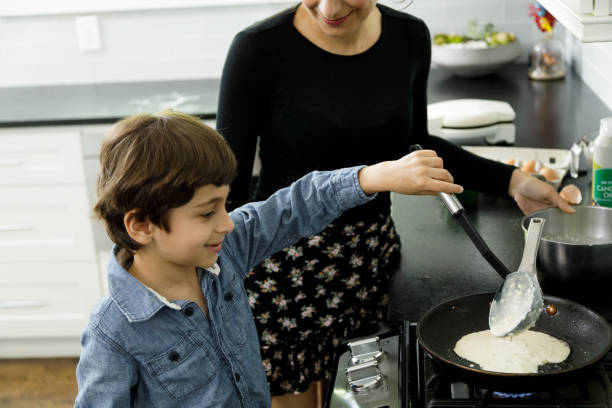 istock Little Boy Learns to Cook 1221865299