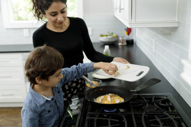 istock Little Boy Learns to Cook 1221865446