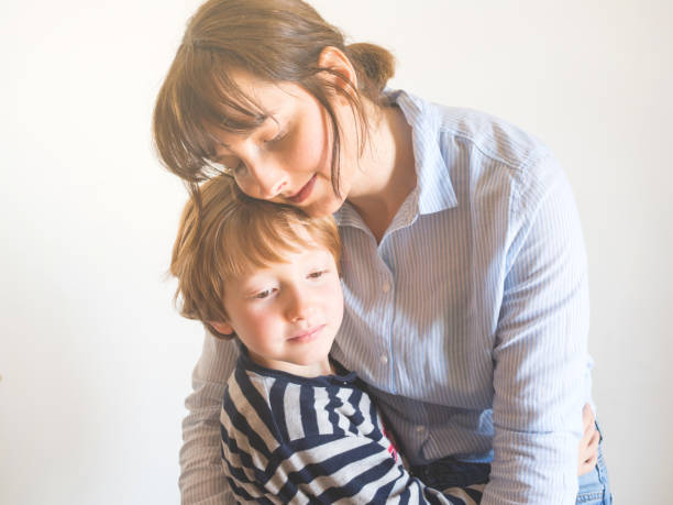 istock Young mother and child hugging. Mothers day 1221869752