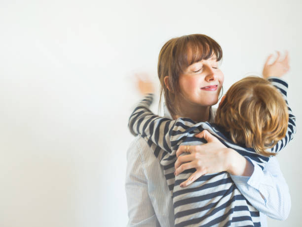 istock Young mother and child hugging. Mothers day 1221869755