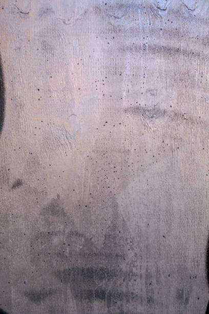 istock hard cement poured wall with wood grain formed  markings and texture 1221871275