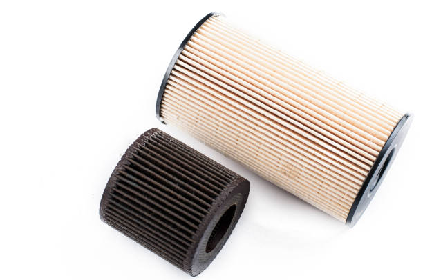 istock Old and new oil filter isolated on white background.Copy space. 1221871381