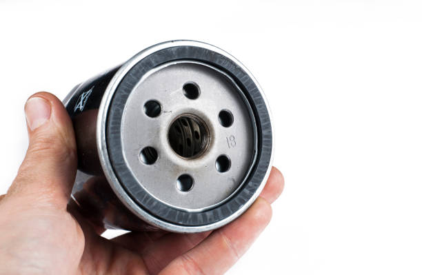 istock New oil filter isolated on white background.Copy space. 1221871532