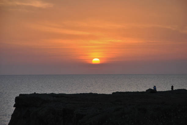 istock Sunset on the calm and peaceful Mediterranean sea 1221872664