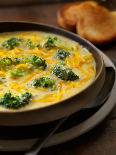 istock Creamy Broccoli and Cheddar Soup with Crusty Bread 1221872768
