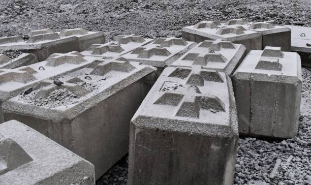 istock Large concrete blocks with crosses, covered in snow. 1221872848