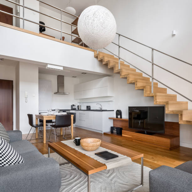 istock Modern apartment with wooden stairs 1221873167