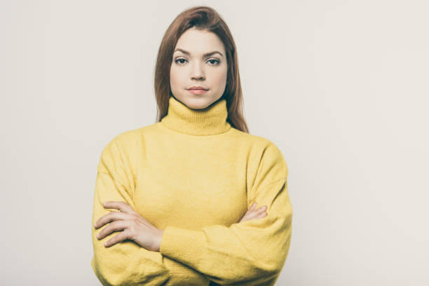 istock Confident young woman looking at camera 1221873373