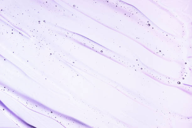 Transparent retinol cream gel serum on multi-colored isolated background