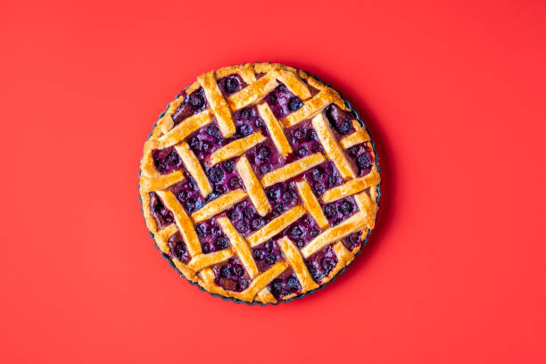 istock Blueberry pie in a tray with a lattice crust. Classic american pie 1221874539