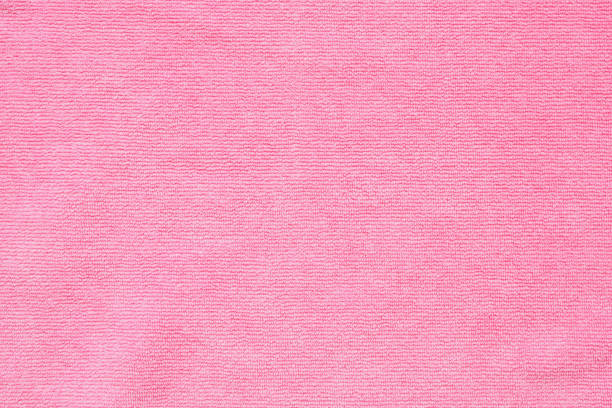 istock Pink towel fabric texture surface close up background 1221874643