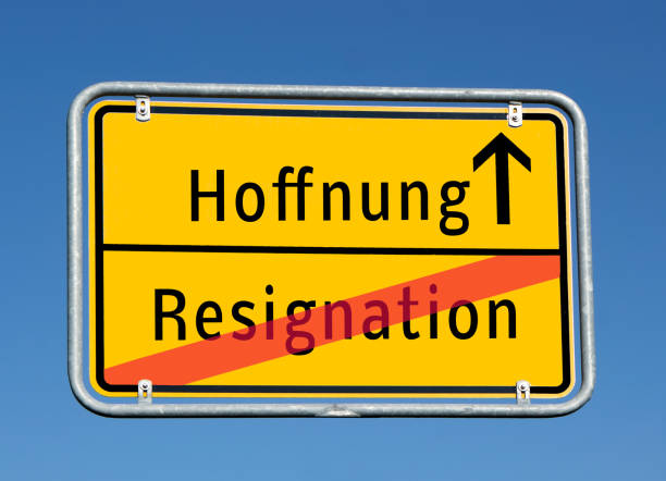 istock Place sign hope / resignation in german 1221874876