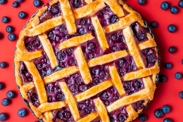 istock Classic blueberry pie close-up. Blueberries tart with a lattice crust 1221876368
