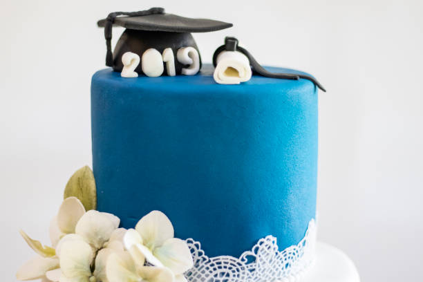 istock Graduation party. Cake table with sweets and decoration 1221880161