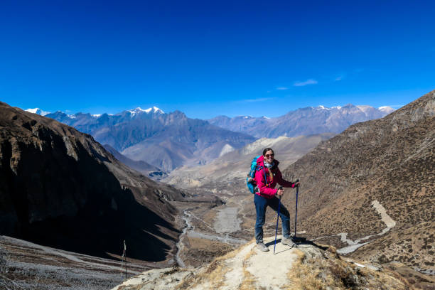 istock Muktinath - A woman wandering in Himalayas 1221880923