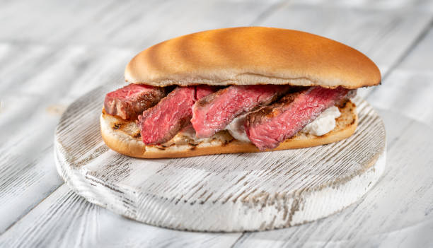 istock Sandwich with sliced beef steak 1221881647