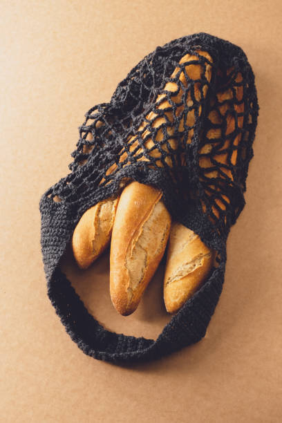 istock Reusable bag with fresh baguettes. 1221882528