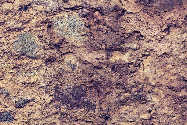 istock Mining cliff rough surface. Heavy grunge damage natural wall background. 1221884855