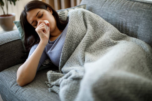 istock Ill woman coughing 1221887172