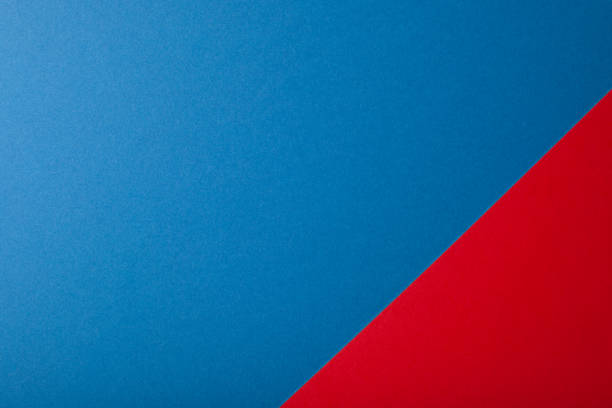 istock Red and blue color of paper background, texture, copy space, diagonal. 1221887469