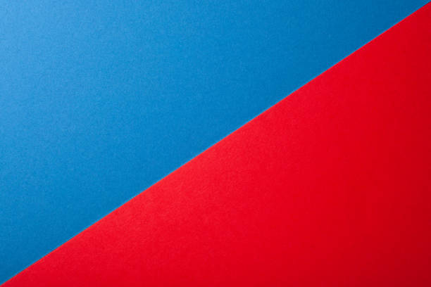istock Blue and red color of paper background, texture, copy space, diagonal. 1221888663